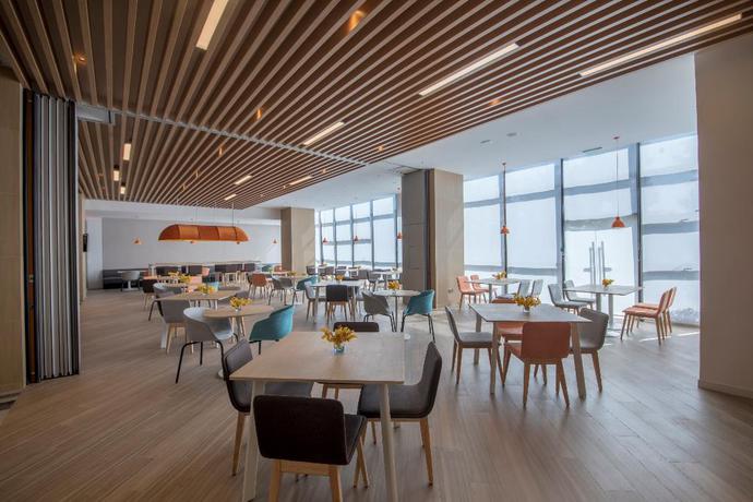 Imagen del bar/restaurante del Hotel Holiday Inn Express Xiamen Airport Harbor. Foto 3