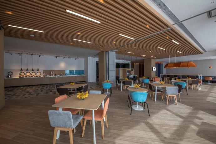 Imagen del bar/restaurante del Hotel Holiday Inn Express Xiamen Airport Harbor. Foto 6