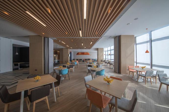 Imagen del bar/restaurante del Hotel Holiday Inn Express Xiamen Airport Harbor. Foto 8