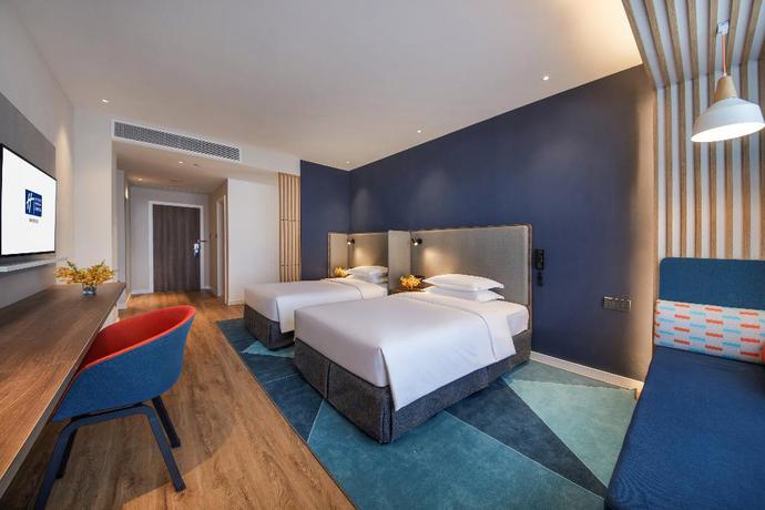 Imagen de la habitación del Hotel Holiday Inn Express Xiamen Airport Harbor. Foto 12