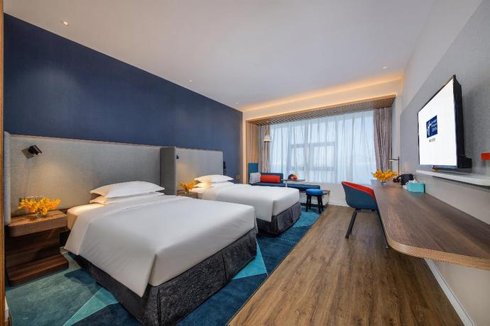 Imagen de la habitación del Hotel Holiday Inn Express Xiamen Airport Harbor. Foto 18