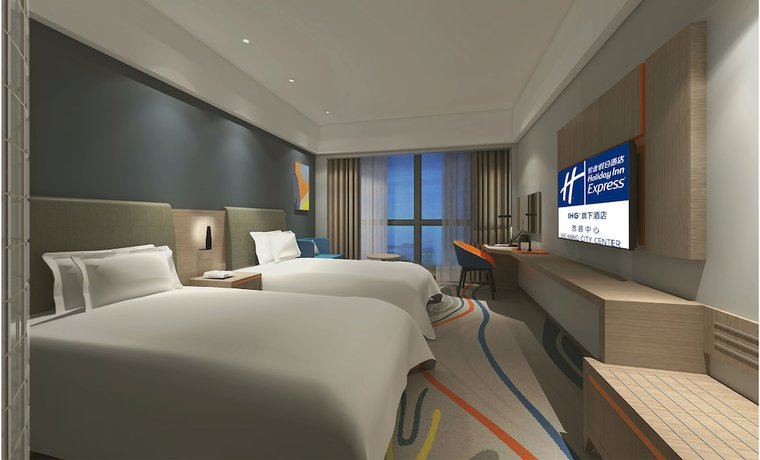 Imagen de la habitación del Hotel Holiday Inn Express Xichang City Center. Foto 8