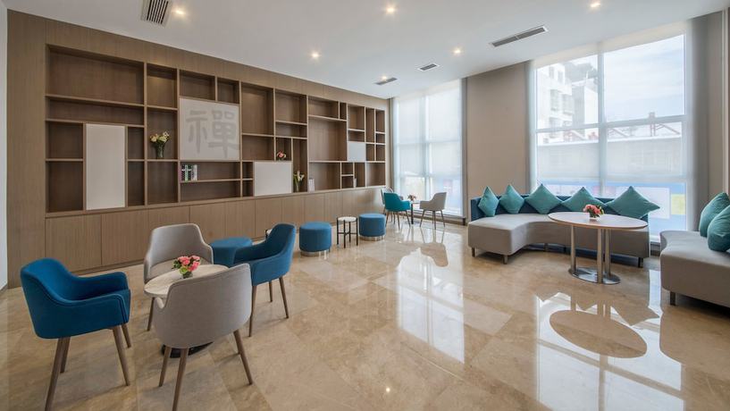 Imagen de los interiores del Hotel Holiday Inn Express Xichang City Center. Foto 18