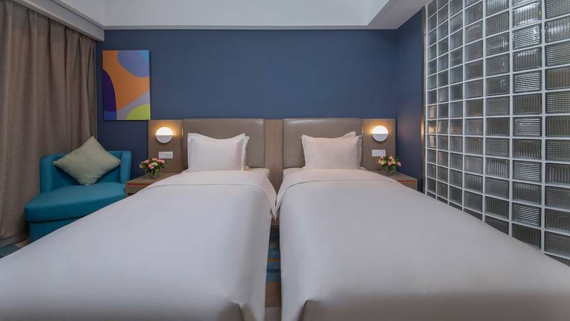 Imagen de la habitación del Hotel Holiday Inn Express Xichang City Center. Foto 12