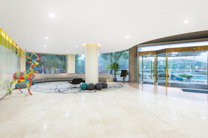Imagen de los interiores del Hotel Holiday Inn Express Yangzhou City Center, An Ihg. Foto 16