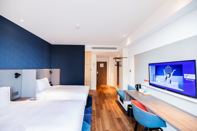 Imagen de la habitación del Hotel Holiday Inn Express Yantai Fulai. Foto 11