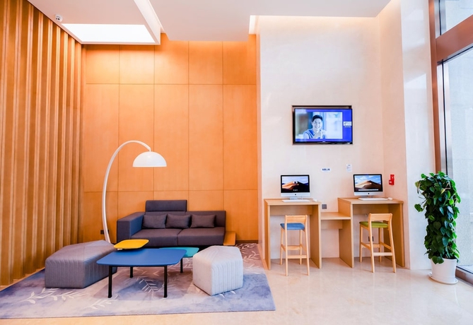 Imagen de los interiores del Hotel Holiday Inn Express Yantai Fulai. Foto 17