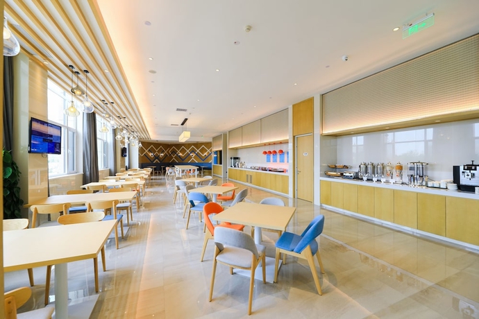 Imagen del bar/restaurante del Hotel Holiday Inn Express Yantai Fulai. Foto 3