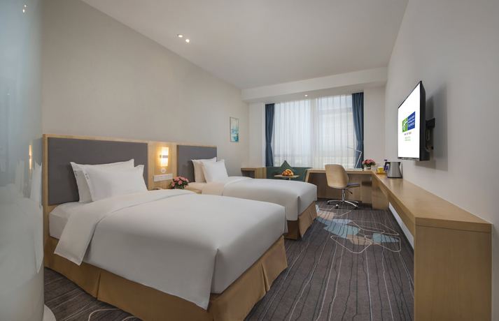 Imagen de la habitación del Hotel Holiday Inn Express Yantai Yeda, An Ihg. Foto 6