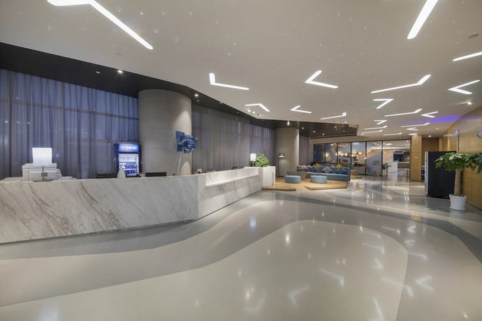 Imagen de los interiores del Hotel Holiday Inn Express Yantai Yeda, An Ihg. Foto 14