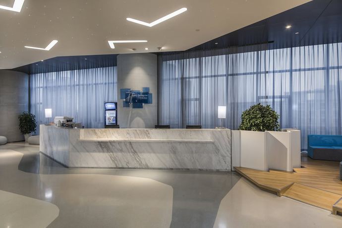 Imagen de los interiores del Hotel Holiday Inn Express Yantai Yeda, An Ihg. Foto 17