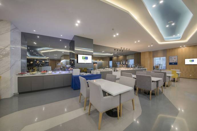 Imagen del bar/restaurante del Hotel Holiday Inn Express Yantai Yeda, An Ihg. Foto 4