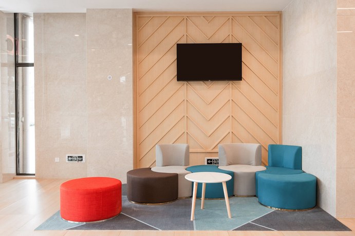 Imagen de los interiores del Hotel Holiday Inn Express Zhangjiagang Free Trade Zone. Foto 18