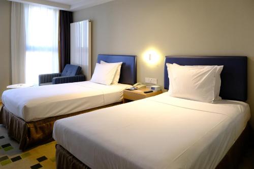 Imagen de la habitación del Hotel Holiday Inn Express Zhangjiakou Park View. Foto 8