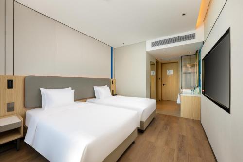 Imagen de la habitación del Hotel Holiday Inn Express Zhanjiang Coast, an IHG. Foto 16