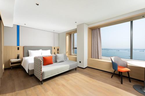Imagen de la habitación del Hotel Holiday Inn Express Zhanjiang Coast, an IHG. Foto 20