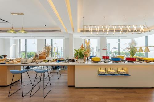 Imagen general del Hotel Holiday Inn Express Zhanjiang Coast, an IHG. Foto 10