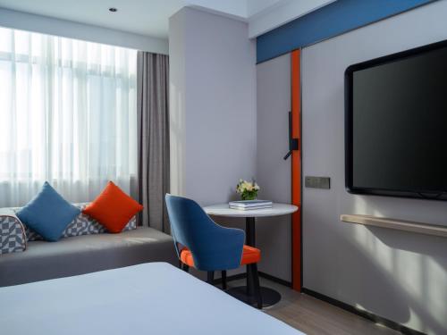 Imagen general del Hotel Holiday Inn Express Zhengzhou Garden Road. Foto 1
