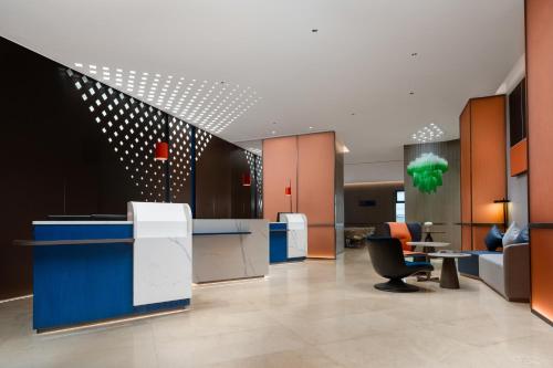 Imagen general del Hotel Holiday Inn Express Zhengzhou Garden Road. Foto 4