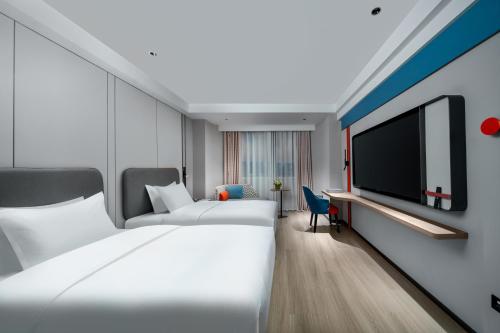 Imagen de la habitación del Hotel Holiday Inn Express Zhengzhou Garden Road. Foto 8