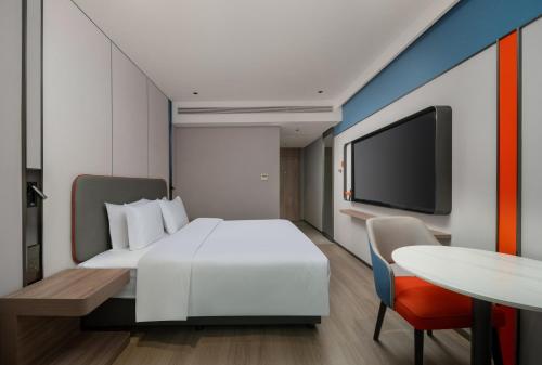 Imagen de la habitación del Hotel Holiday Inn Express Zhengzhou Garden Road. Foto 13