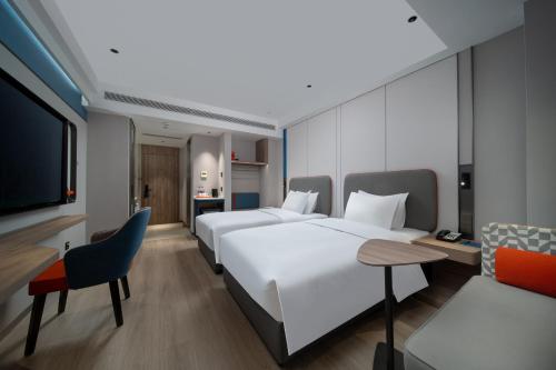 Imagen de la habitación del Hotel Holiday Inn Express Zhengzhou Garden Road. Foto 14