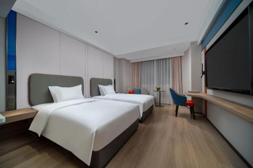 Imagen de la habitación del Hotel Holiday Inn Express Zhengzhou Garden Road. Foto 15