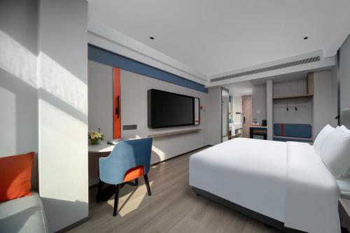 Imagen de la habitación del Hotel Holiday Inn Express Zhengzhou Garden Road. Foto 16