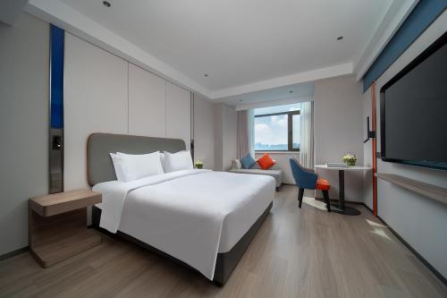 Imagen de la habitación del Hotel Holiday Inn Express Zhengzhou Garden Road. Foto 18