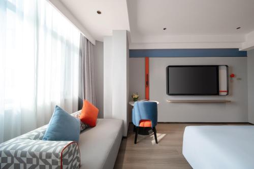 Imagen de la habitación del Hotel Holiday Inn Express Zhengzhou Garden Road. Foto 19