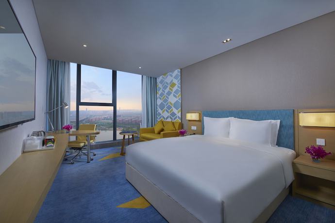 Imagen de la habitación del Hotel Holiday Inn Express Zhengzhou Longzi Lake, An Ihg. Foto 4
