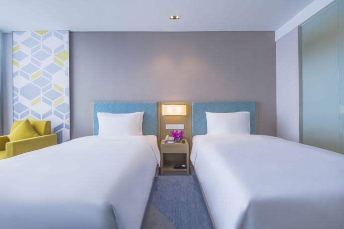 Imagen de la habitación del Hotel Holiday Inn Express Zhengzhou Longzi Lake, An Ihg. Foto 10