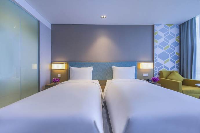 Imagen de la habitación del Hotel Holiday Inn Express Zhengzhou Longzi Lake, An Ihg. Foto 17