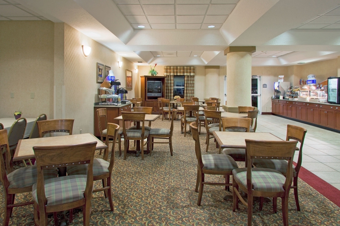 Imagen del bar/restaurante del Hotel Holiday Inn Express & Suites Orlando International Airport. Foto 4