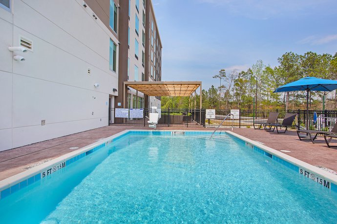 Imagen de la piscina del Hotel Holiday Inn Express and Suites Covington, An Ihg. Foto 19
