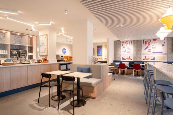 Imagen del bar/restaurante del Hotel Holiday Inn Express and Suites Ghent by IHG. Foto 3