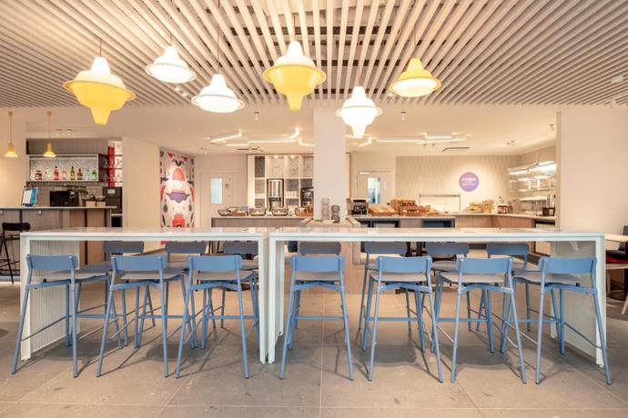 Imagen del bar/restaurante del Hotel Holiday Inn Express and Suites Ghent by IHG. Foto 4