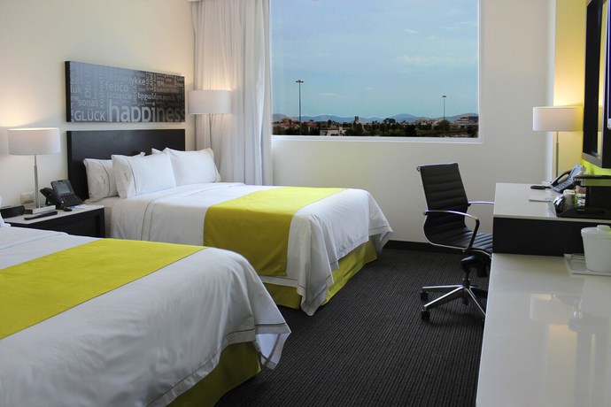 Imagen de la habitación del Hotel Holiday Inn Express and Suites Puebla Angelopolis. Foto 3
