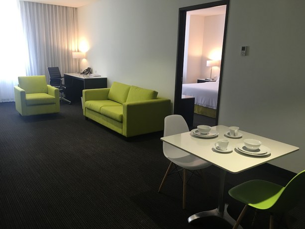 Imagen de la habitación del Hotel Holiday Inn Express and Suites Puebla Angelopolis. Foto 10