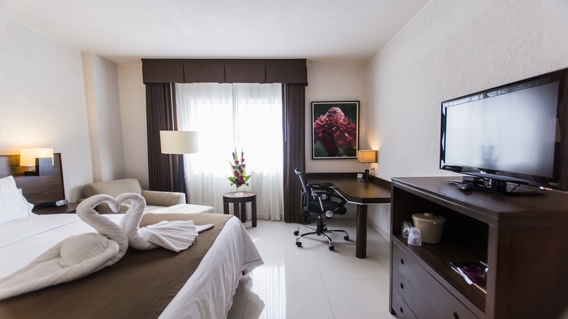 Imagen de la habitación del Hotel Holiday Inn Express and Suites Tuxtla Gutierrez La Marimba, An Ihg. Foto 14