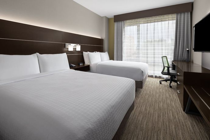 Imagen de la habitación del Hotel Holiday Inn Express and Suites Woodside LaGuardia Airport. Foto 10