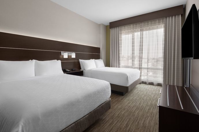 Imagen de la habitación del Hotel Holiday Inn Express and Suites Woodside LaGuardia Airport. Foto 13