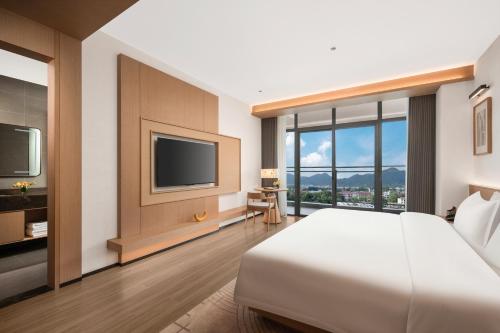 Imagen de la habitación del Hotel Holiday Inn Ganzhou Orchid Town, an IHG. Foto 12