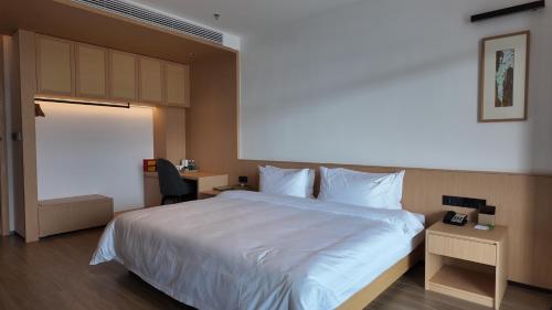 Imagen de la habitación del Hotel Holiday Inn Ganzhou Orchid Town, an IHG. Foto 14