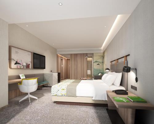 Imagen de la habitación del Hotel Holiday Inn Guangzhou South Lake. Foto 3