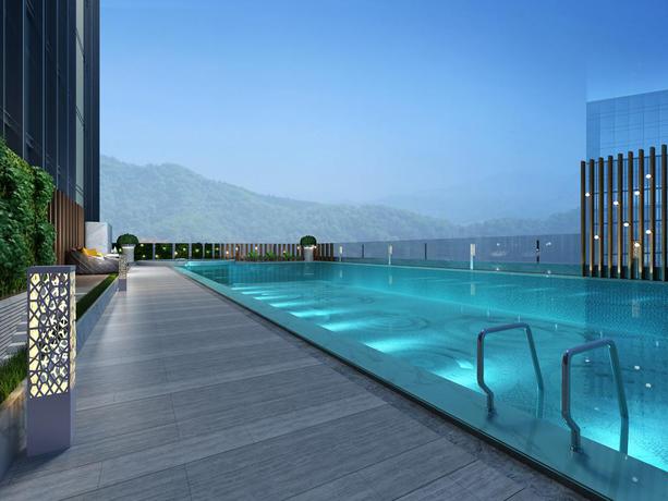 Imagen de la piscina del Hotel Holiday Inn Guangzhou South Lake. Foto 7