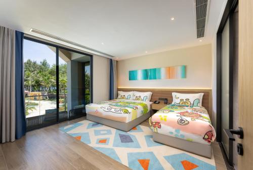 Imagen de la habitación del Hotel Holiday Inn Hainan Xiangshui Bay, an IHG. Foto 11