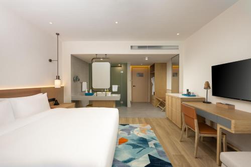 Imagen de la habitación del Hotel Holiday Inn Hainan Xiangshui Bay, an IHG. Foto 16