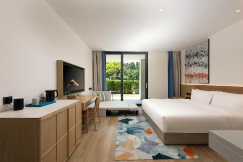 Imagen de la habitación del Hotel Holiday Inn Hainan Xiangshui Bay, an IHG. Foto 17