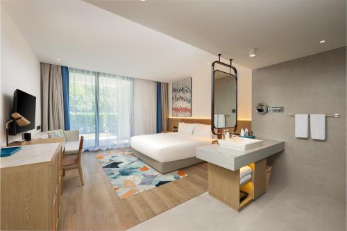Imagen de la habitación del Hotel Holiday Inn Hainan Xiangshui Bay, an IHG. Foto 18